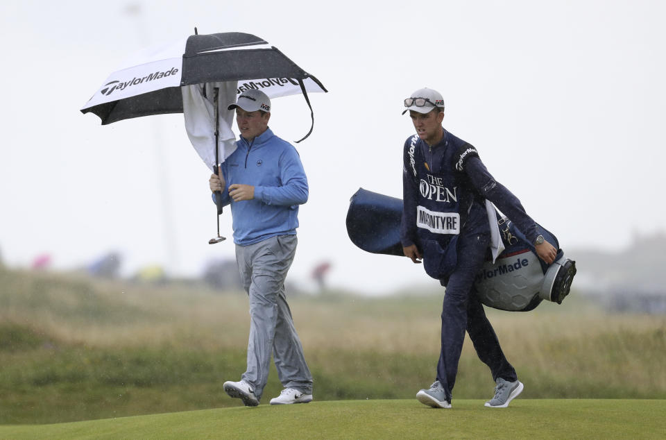 Scotland's Rob Macintyre walks to the 18th green during the first round of the British Open Golf Championships at Royal Portrush in Northern Ireland, Thursday, July 18, 2019.(AP Photo/Peter Morrison)