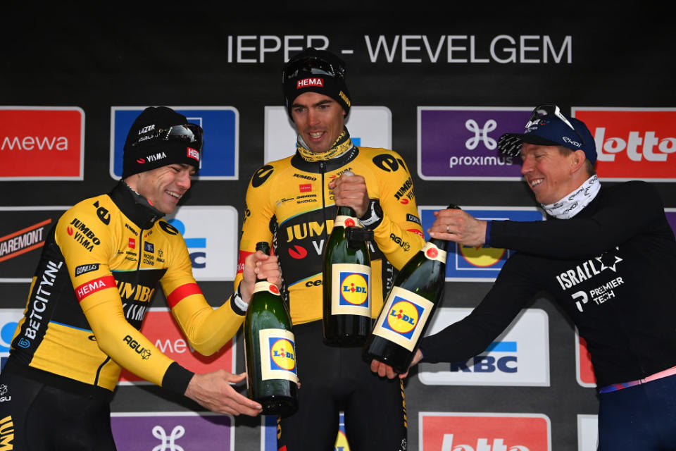 WEVELGEM BELGIUM  MARCH 26 LR Wout Van Aert of Belgium and Team JumboVisma on second place race winner Christophe Laporte of France and Team JumboVisma and Sep Vanmarcke of Belgium and Team Israel  Premier Tech on third place celebrate on the podium ceremony after the 85th GentWevelgem in Flanders Fields 2023 Mens Elite a 2609km one day race from Ypres to Wevelgem  UCIWT  on March 26 2023 in Wevelgem Belgium Photo by Tim de WaeleGetty Images