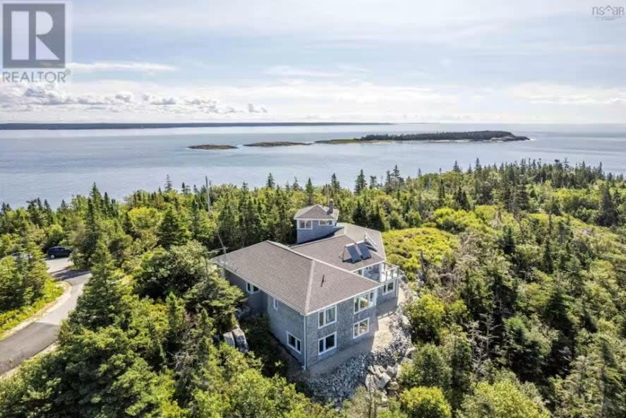 Multiple listings of homes for sale on the Aspotogan peninsula, like this one on White Point Run, show how forest completely surrounds the lot.