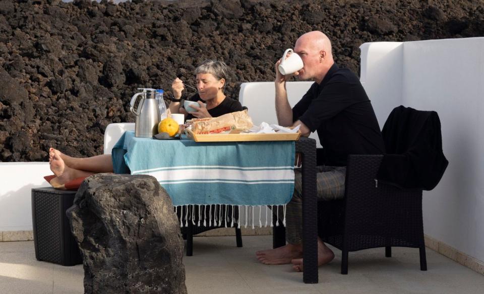 Breakfast at a guesthouse surrounded by black rocks