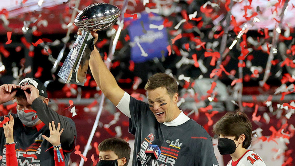 Pictured here, Tom Brady holds the trophy aloft at Super Bowl LV.