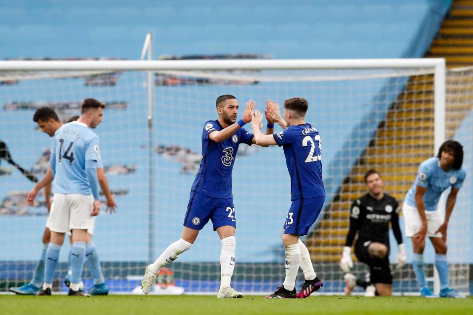 Hakim Ziyech celebrates with Billy GilmourGetty