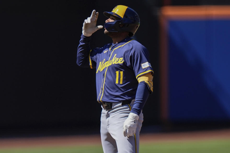 Milwaukee Brewers' Jackson Chourio (11) gestures after hitting an RBI double against the New York Mets during the second inning of a baseball game Sunday, March 31, 2024, in New York. (AP Photo/Frank Franklin II)