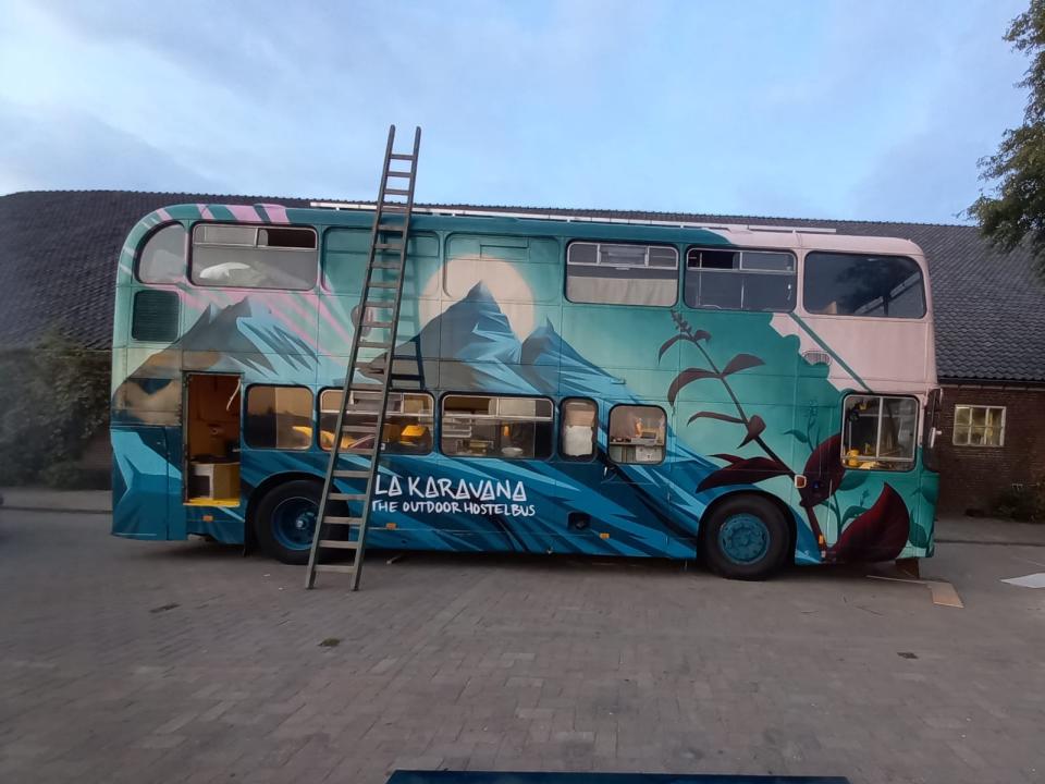 La Karavana bus after it was painted with mountains