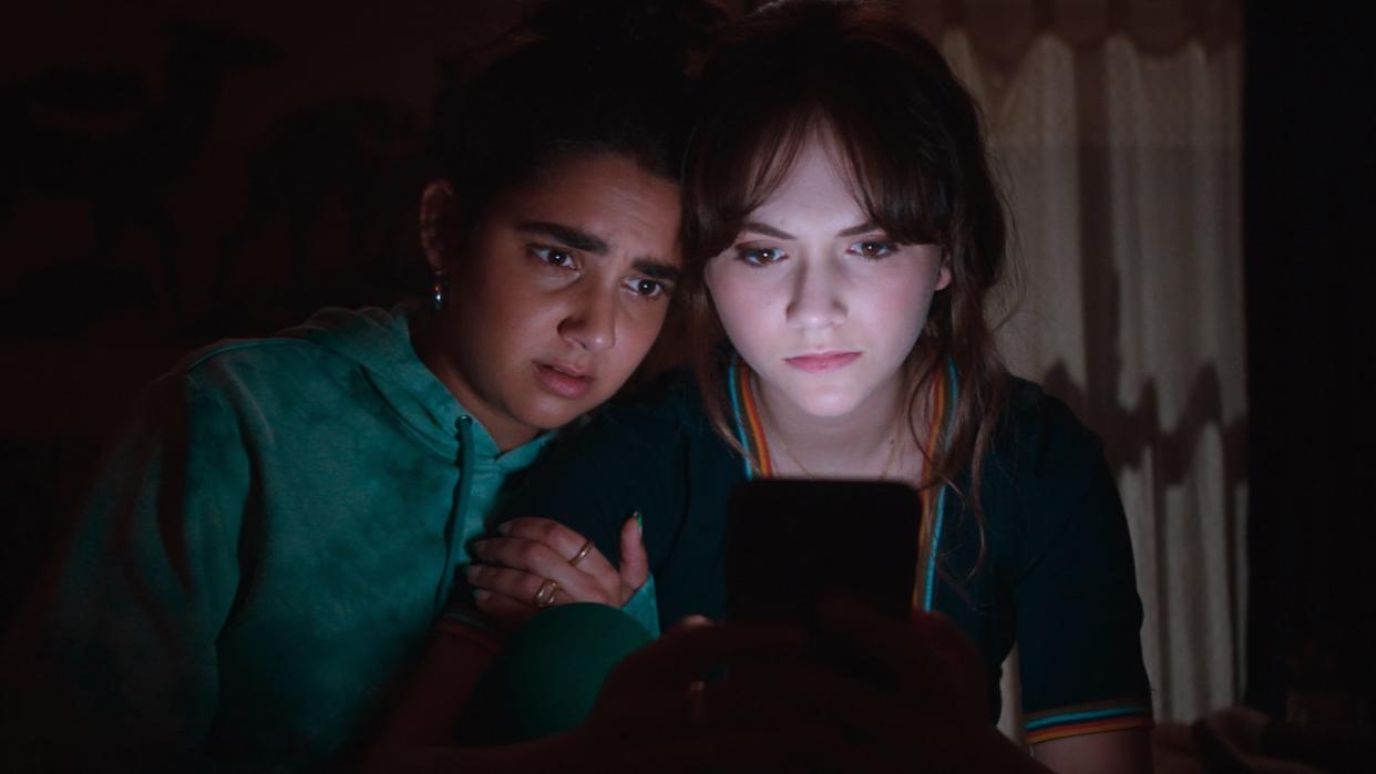 Geraldine Viswanathan, left, and Emilia Jones, right, in "Cat Person," a 2023 movie directed by Susanna Fogel.