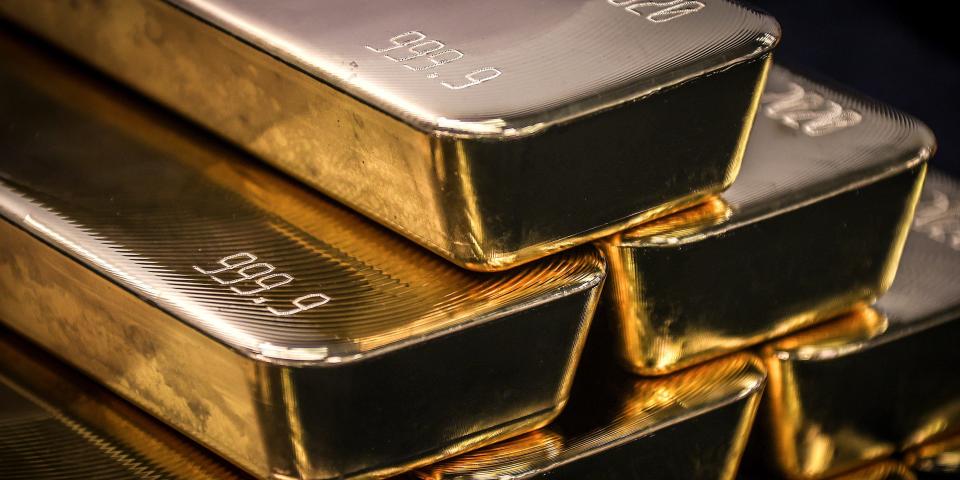 Gold bullion bars are pictured after being inspected and polished at the ABC Refinery in Sydney on August 5, 2020.