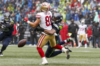 <p>Seattle Seahawks outside linebacker K.J. Wright (50) breaks up a pass intended for San Francisco 49ers wide receiver Trent Taylor (81) during the second quarter at CenturyLink Field. Mandatory Credit: Joe Nicholson-USA TODAY Sports </p>