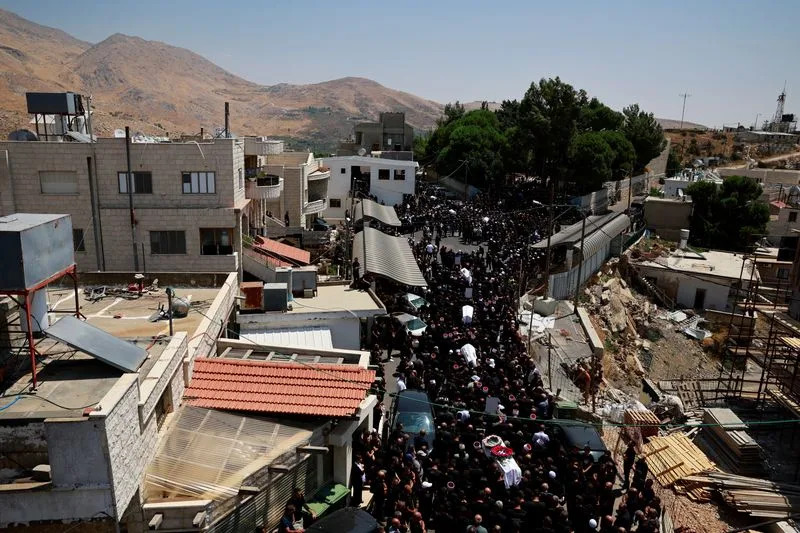 Funeral of children who were killed at a soccer pitch by a rocket fired from Lebanon, in Majdal Shams