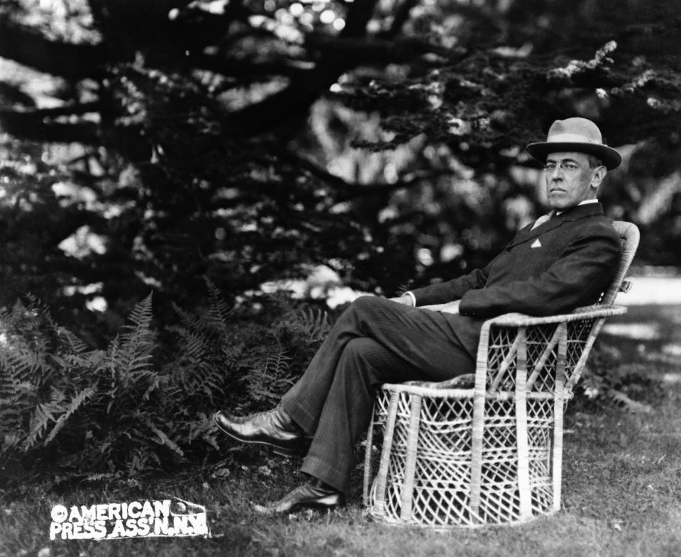 Portrait of American President Woodrow Wilson seated outdoors, circa 1920. (Photo by Fotosearch/Getty Images).