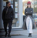 <p>Matt Smith and Lily James give each other space during a walk on Sunday in London.</p>