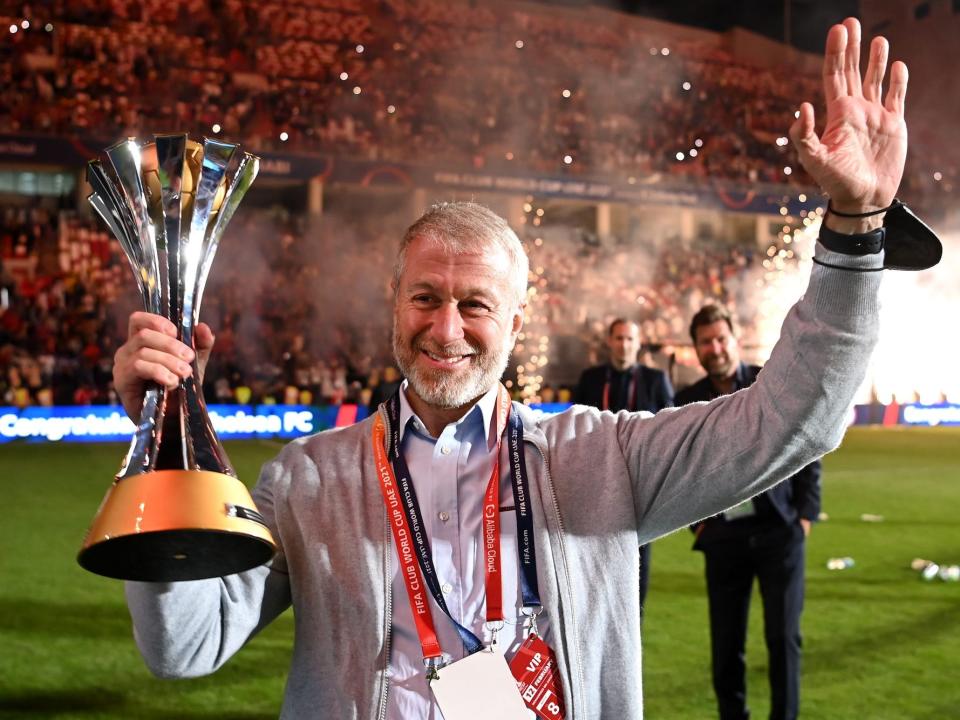 Roman Abramovich, Owner of Chelsea celebrates with The FIFA Club World Cup trophy following their side's victory during the FIFA Club World Cup UAE 2021 Final match between Chelsea and Palmeiras at Mohammed Bin Zayed Stadium