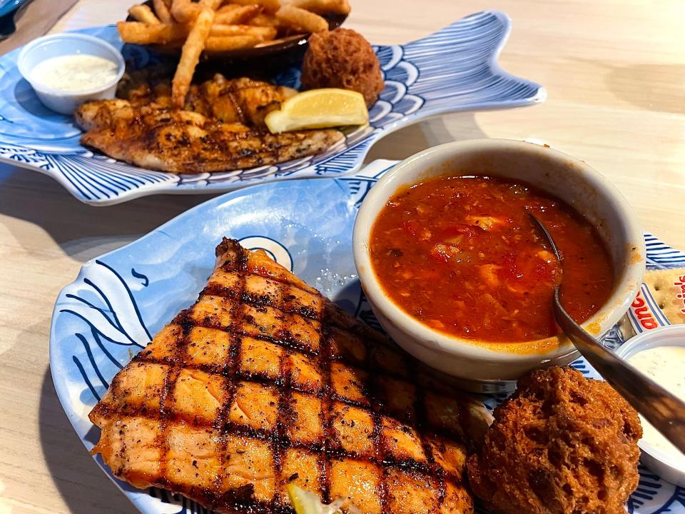 Grilled lemon pepper salmon, fish chowder and grilled catfish filets from Aunt Catfish's On the River in Port Orange.