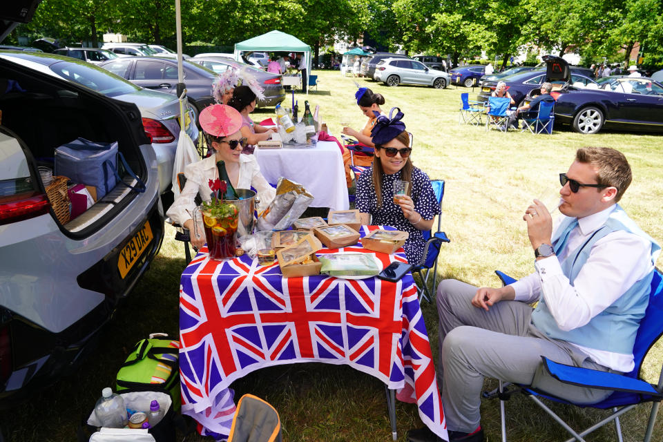 Racegoers enjoy a picnic in the car park ahead of day four of Royal Ascot at Ascot Racecourse. Picture date: Friday June 17, 2022. (PA Images)