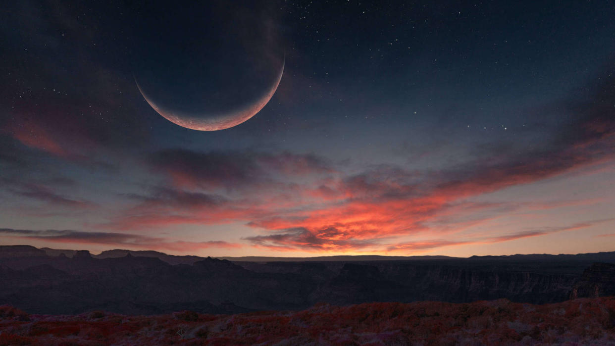  A giant crescent moon hangs like a dim red bowl in a darkening re-clouded sky. A dark hilly landscape stretches beneath. 