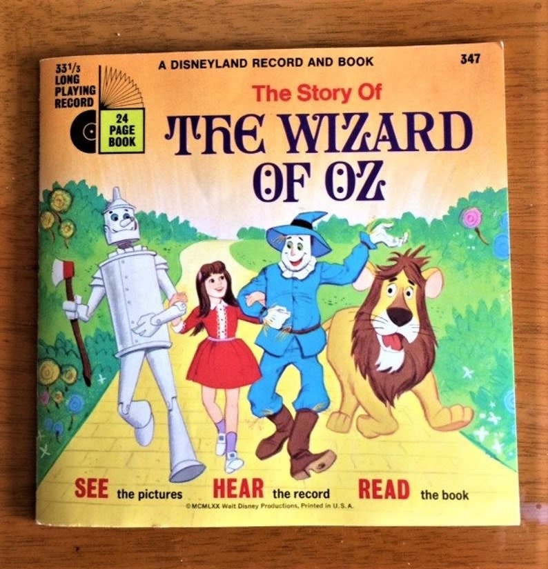 A Disney Book on Record from the '70s, featuring a drawing of the Tin Man, Dorothy, Scarecrow, and Cowardly Lion walking down the Yellow Brick Road