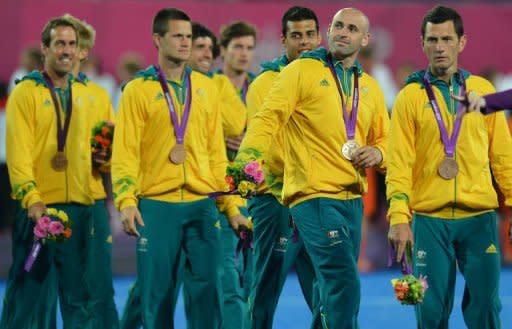 Australian men's field hockey team, seen here with their bronze medals after the podium ceremony at the London 2012 Olympic Games, on August 11. While New Zealanders celebrated one of their most successful Olympics ever, recriminations were underway in Australia which only finished 10th, down from sixth in Beijing, with just seven golds for its worst victory tally in 20 years