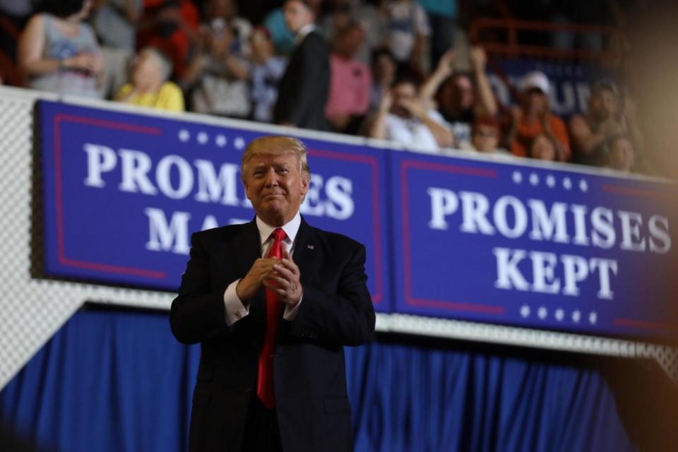 US President Donald Trump leads a rally marking his first 100 days in office in Harrisburg (REUTERS)