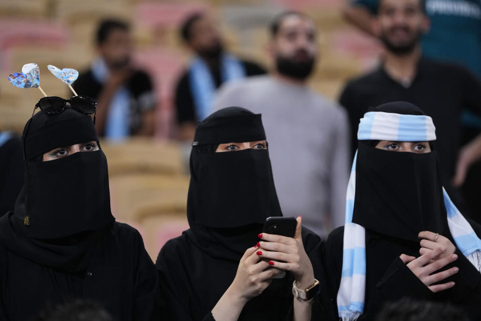 Manchester City fans attend the trophy ceremony after the end of the Soccer Club World Cup final match between Manchester City FC and Fluminense FC at King Abdullah Sports City Stadium in Jeddah, Saudi Arabia, Friday, Dec. 22, 2023. Manchester City won 4-0. (AP Photo/Manu Fernandez)