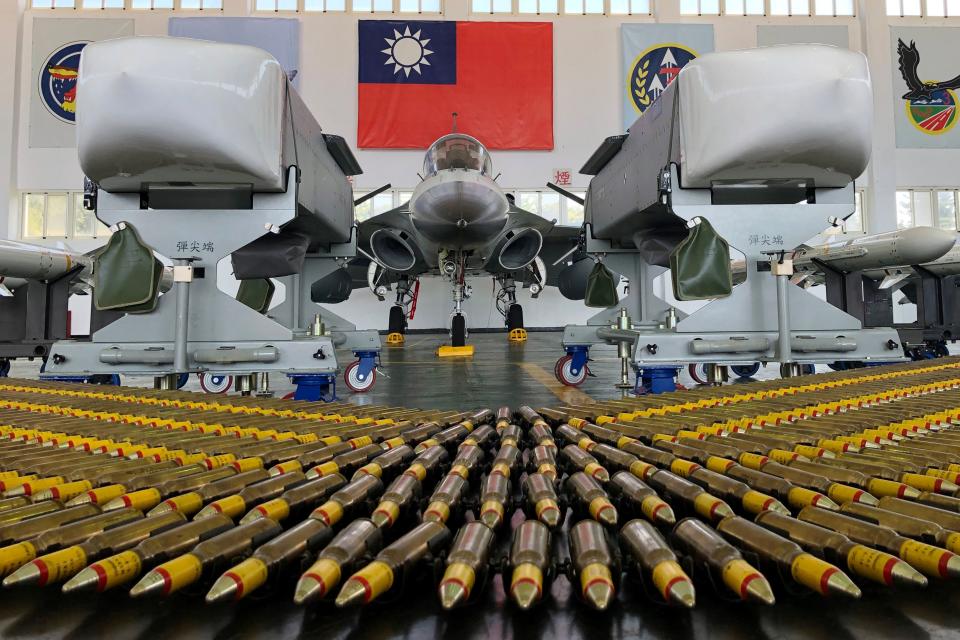 A fighter jet and air-to-ground cruise missiles are seen at Makung Air Force Base in Taiwan's offshore island of Penghu. 