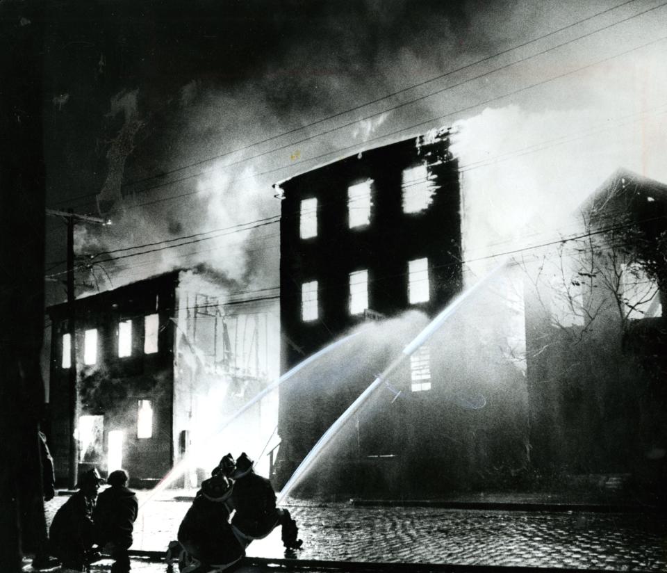 October 14 1973 / fromthearchive / Globe staff photo by David L. Ryan / Chelsea firemen fight the blaze at some junk shop businesses on 2nd Avenue.  The fire devastated 18 city blocks and destroyed an estimated 303 buildings  leaving more than 600 persons unemployed.