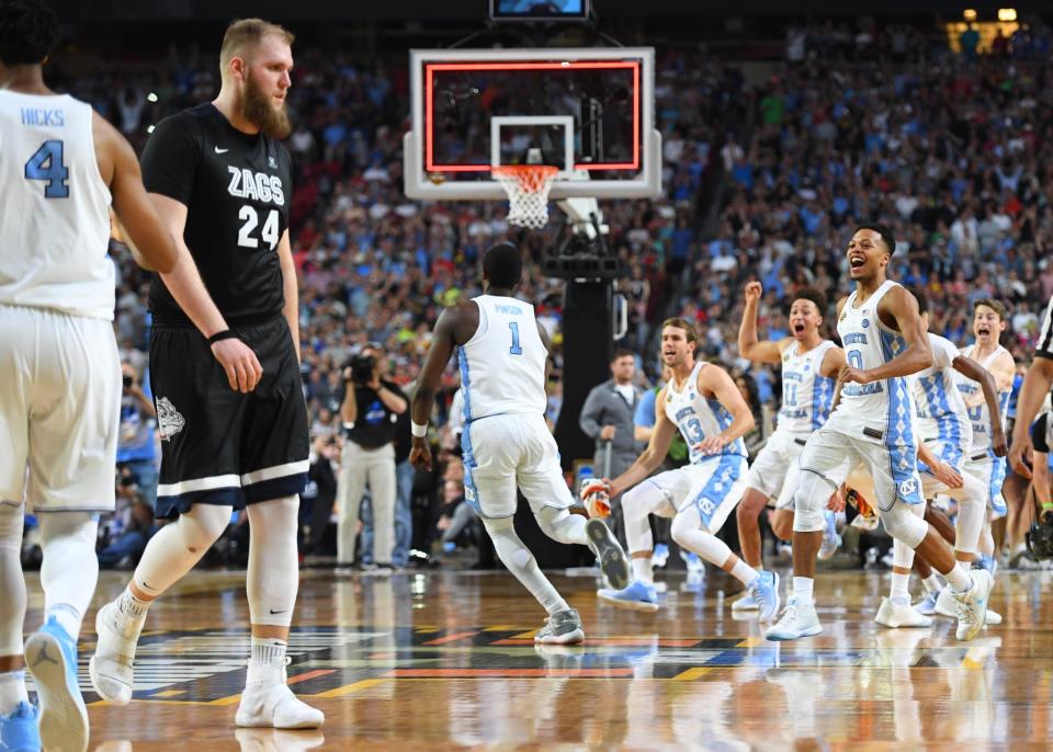 <p>North Carolina Tar Heels players celebrate after defeating the Gonzaga Bulldogs in the championship game of the 2017 NCAA Men’s Final Four at University of Phoenix Stadium. Mandatory Credit: Bob Donnan-USA TODAY Sports </p>