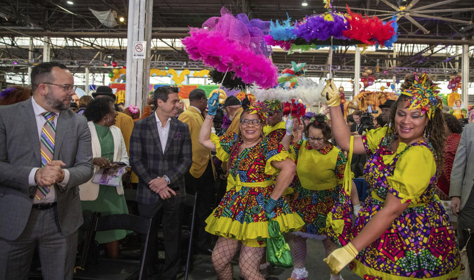 The Baby Dolls make an entrance during the King's Day celebration while kicking-off the official start of 2023 Carnival Season in New Orleans, Friday, Jan. 6, 2023. (David Grunfeld/The Times-Picayune/The New Orleans Advocate via AP)