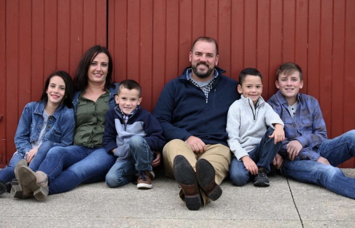 Nicholas and Shelly Welgat pose with their children in this undated family photo. Nicholas Welgat, the chief of police in Kewanee, was diagnosed with stage 4 lung cancer July 12.