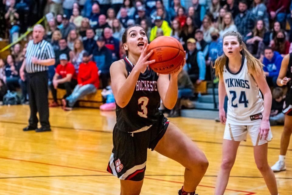 Old Rochester's Logan Fernandes finishes off the layup.