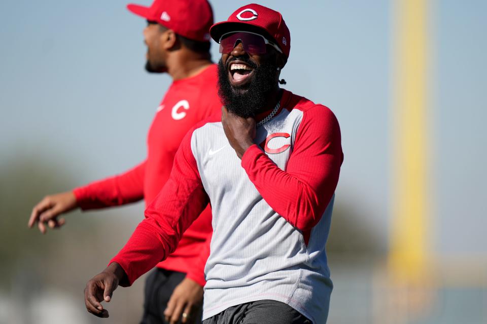 Cincinnati Reds outfielder Josh Harrison smiles during spring training workouts, Saturday, Feb. 17, 2024, at the team's spring training facility in Goodyear, Ariz.