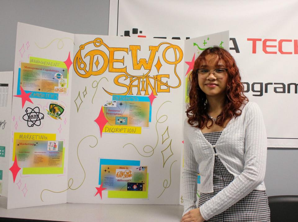 Emily Truong, a sophomore at Salina Central High School, presented her business "Dew Shine," which provides a variety of graphic design services.