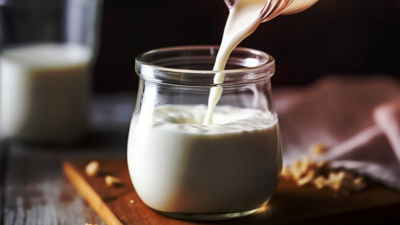 Pouring buttermilk into glass