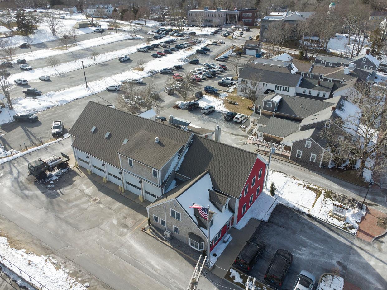 A view looking west shows the Barnstable Fire Department building, lower center, with the Barnstable Superior Courthouse and Probate Courthouse at the top of the frame. The firehouse property makes for a tight fit for vehicles and staff so the fire district wants to build a new station on land on Phinney's Lane.