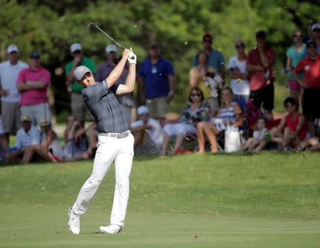 May 28, 2016; Fort Worth, TX, USA; Jordan Spieth hits his approach on the 17th hole during the third round of the 2016 Dean & Deluca Invitational. at Colonial Country Club. Mandatory Credit: Erich Schlegel-USA TODAY Sports