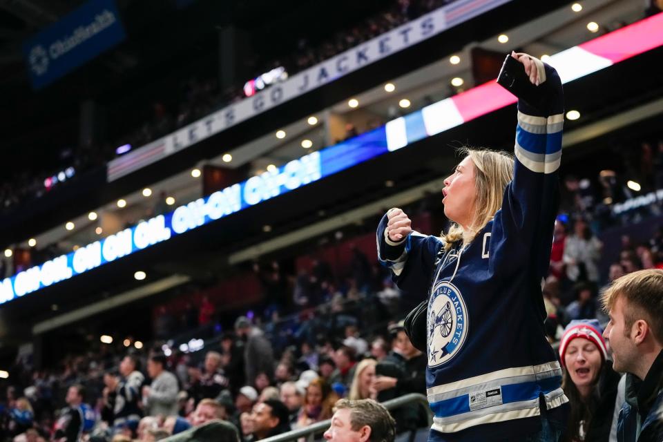 Jan 19, 2024; Columbus, Ohio, USA; Columbus Blue Jackets fans cheer during the third period of the NHL hockey game against the New Jersey Devils at Nationwide Arena. The Blue Jackets lost 4-1.