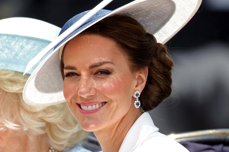 Duchess of Cambridge rides in a carriage during the Trooping the Colour parade