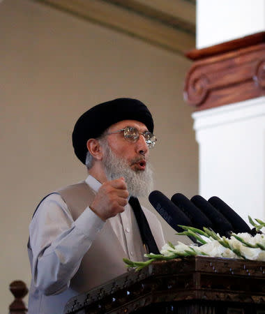 Afghan warlord Gulbuddin Hekmatyar speaks during a welcoming ceremony at the presidential palace in Kabul, Afghanistan May 4, 2017. REUTERS/Omar Sobhani