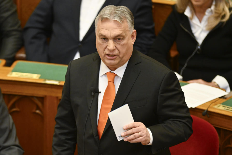 Hungarian Prime Minister Viktor Orban speaks after addressing a parliament session, on the day lawmakers are expected to approve Sweden's accession into NATO, in Budapest, Hungary, Monday, Feb 26, 2024. Hungary's parliament is to vote Monday on ratifying Sweden's bid to join NATO, likely bringing an end to more than 18 months of delays that have frustrated the alliance as it seeks to expand in response to Russia's war in Ukraine. (AP Photo/Denes Erdos)