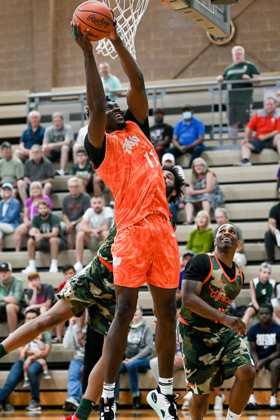 Team Faygo and MSU center Mady Sissoko scores against Team Game Cuffs on Tuesday, July 12, 2022, during the Moneyball Pro-Am at Holt High School.