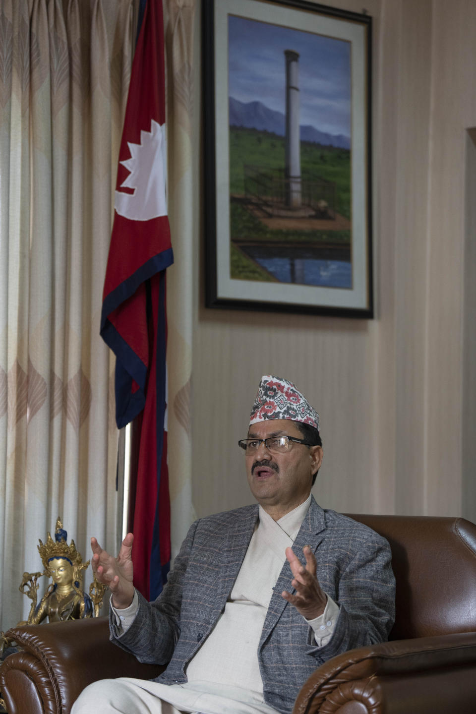 Nepal's Foreign Minister Narayan Prakash Saud speaks to the Associated Press during an interview at his office in Kathmandu, Nepal, Thursday, Jan. 25, 2024. Nepal has asked Russia to send back hundreds of Nepali nationals who have been recruited to fight against Ukraine and repatriate the bodies of those who were killed in the conflict, Nepal's foreign minister said Thursday. (AP Photo/Niranjan Shrestha)