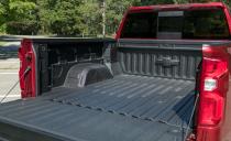 <p>Payload and tow ratings are up by a few hundred pounds for some models, and the Silverado's new bed is constructed in three pieces, which allows the wheel wells to be stamped differently, increasing cargo volume to 63 cubic feet in short-bed models.</p>