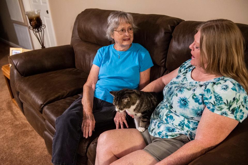 Beverly Roberts and Mary Alston pet Big Boy at Alston’s home in Wetumpka, Ala., on Thursday, Sept. 29, 2022.