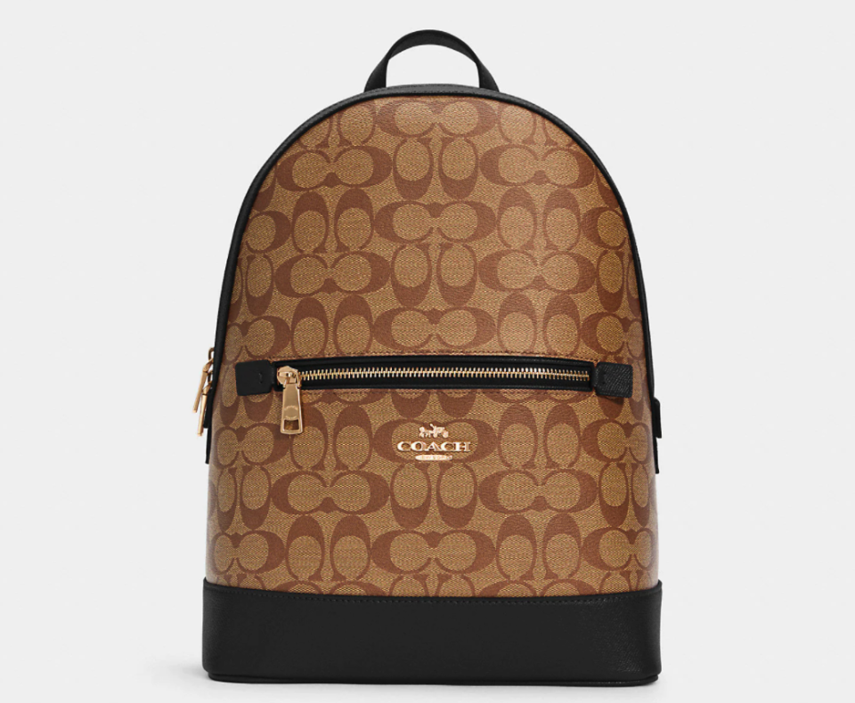 Kenley Backpack In Signature Canvas. Image via Coach Outlet.