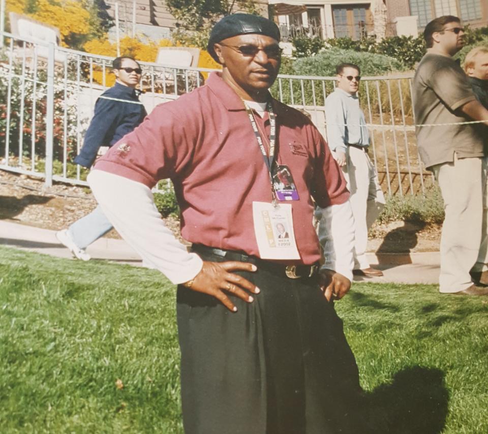 Pete McDaniel works at a PGA tournament in 2002.