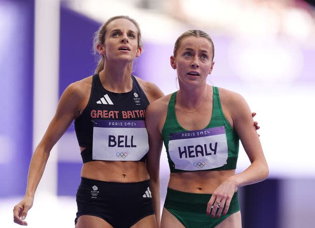 Great Britain's Georgia Bell stands with Ireland's Sarah Healy on the Olympic track in Paris