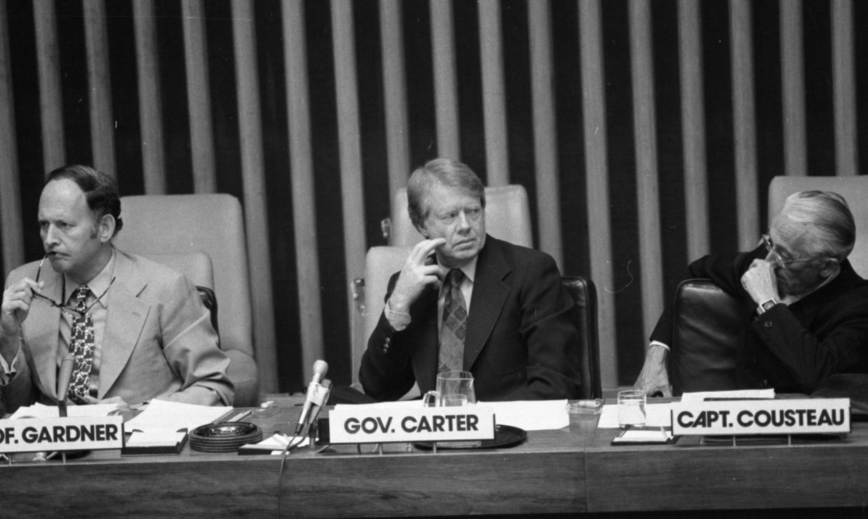 Former Gov. Jimmy Carter and noted undersea explorer Jacques Cousteau participate in a conference on nuclear energy and world order on May 14, 1976, at the UN.