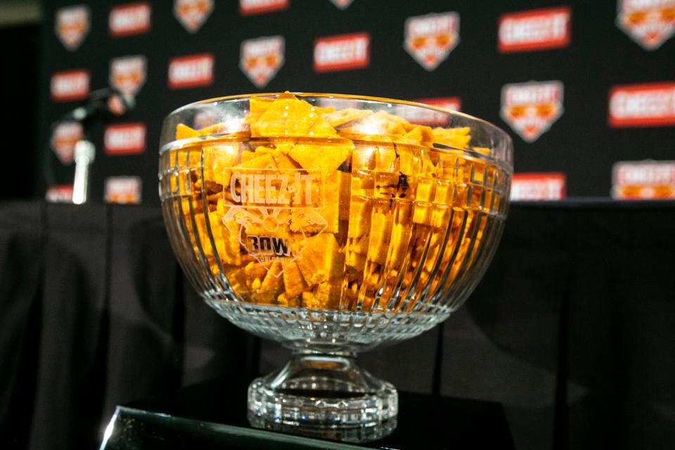 A bowl full of Cheez-It crackers.