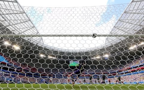 Christian Eriksen of Denmark scores his team's first goal past Mathew Ryan of Australia during the 2018 FIFA World Cup Russia group C match between Denmark and Australia at Samara Arena on June 21, 2018 in Samara, Russia - Credit: Getty Images