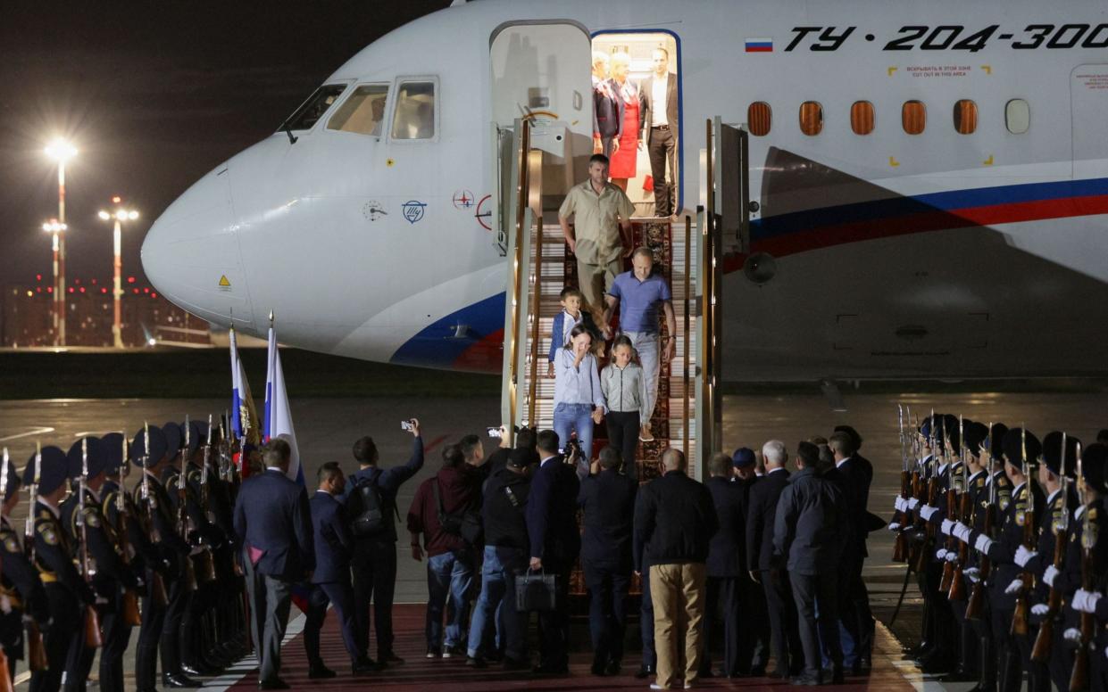 The family were given a large welcome when they arrived back in Russia