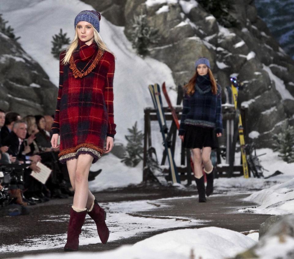 Fashion from the Tommy Hilfiger Fall 2014 collection is modeled during New York Fashion Week on Monday Feb. 10, 2014. (AP Photo/Bebeto Matthews)