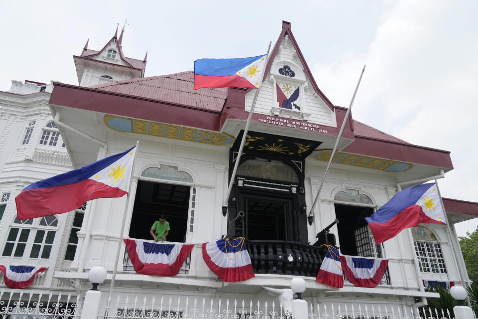 Workers prepare the Emilio Aguinaldo Shrine where Philippine independence from Spain was proclaimed in Kawit, Cavite province, Philippines, Monday, June 10, 2024. The revelry surrounding Philippine Independence Day, which falls on June 12, stretches far beyond the Southeast Asia archipelago. Millions of Filipinos across major U.S. cities, as well as Europe, Australia, and even the United Arab Emirates, will be able to find parades, street fairs, galas, and other gatherings close to home. (AP Photo/Aaron Favila)